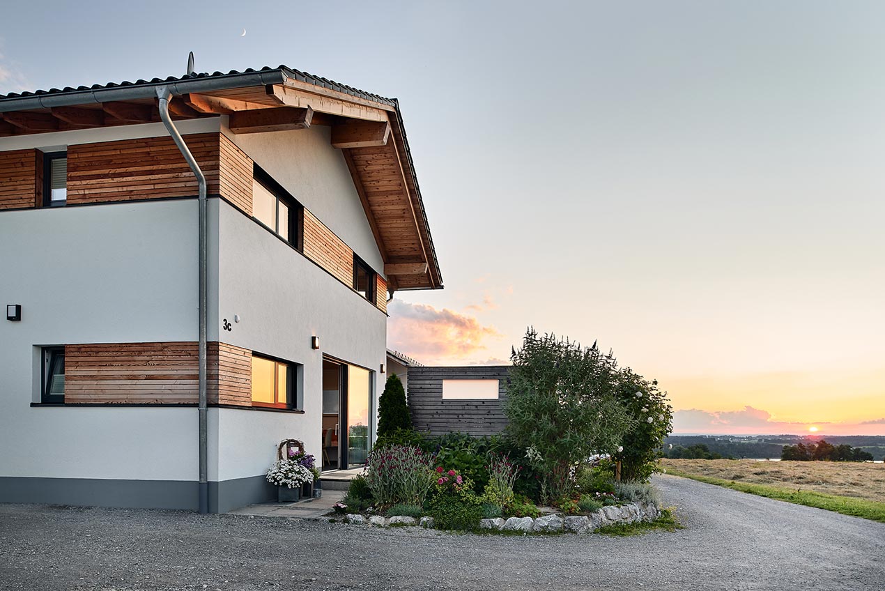 Massivholzhaus Riedering Sonnenuntergang